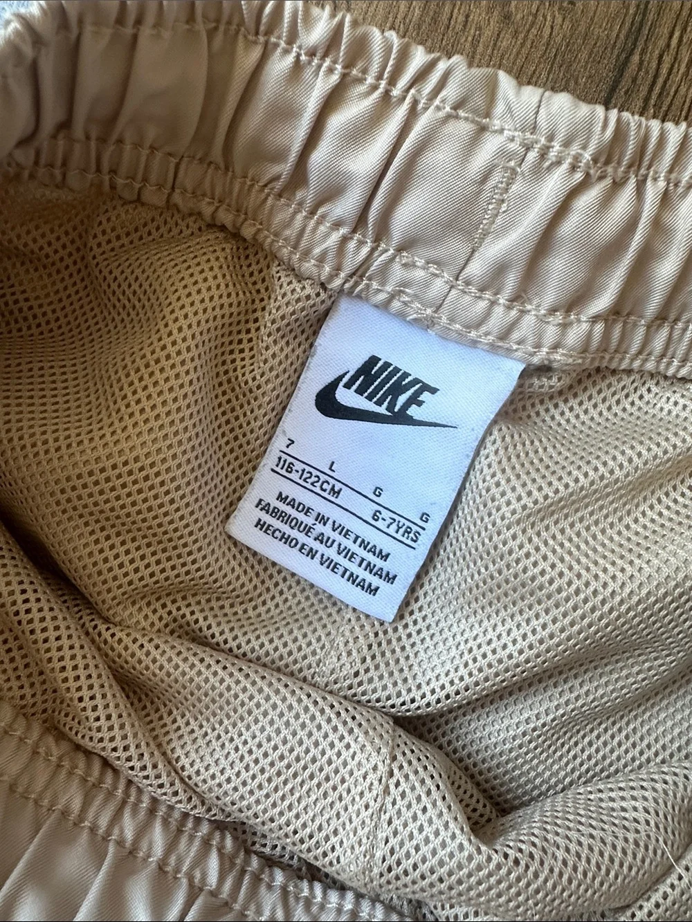 Nike Kids Beige Elastic Waist Shorts with White Drawstring